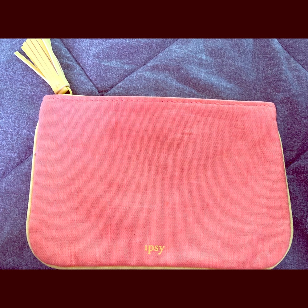 Orange & yellow make up bag.